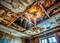 Leaking Roof Causing Severe Water Damage to Ceiling Dramatic Visual of Decay and Neglect Royalty Free Stock Photo