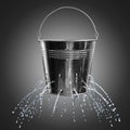 Leaky bucket with water on background