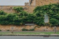 Leamington Road street name sign against cottage and green foliage in Broadway, Cotswolds, UK Royalty Free Stock Photo