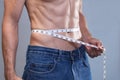 Lean abs measurement Royalty Free Stock Photo