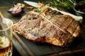 Lean healthy grilled t-bone steak with herbs