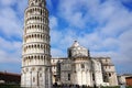 Leaning Tower and Cathedral of Santa Maria Assunta in Piazza dei Miracoli also known as Piazza del Duomo with tourists, Pisa Italy Royalty Free Stock Photo