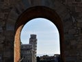 View of the Leaning Tower of Pisa through Arch Royalty Free Stock Photo