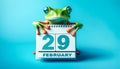 Leap Year Concept with Frog and Calendar on blue background
