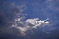 Learjet 45 with Blue Sky & Storm Clouds Royalty Free Stock Photo