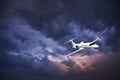 Learjet 45 with Storm Clouds Royalty Free Stock Photo