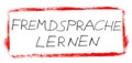 Learn another language - German handwritten text in red banner Royalty Free Stock Photo