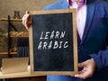 LEARN ARABIC sign on the blackboard