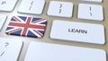 Learn British English Language Concept. Online Study Courses. Button with Text on Keyboard. 3D Illustration Royalty Free Stock Photo