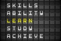 Learn buzzwords on black mechanical board Royalty Free Stock Photo