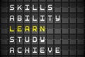 Learn buzzwords on black mechanical board Royalty Free Stock Photo