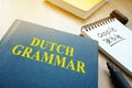 Learn dutch grammar. Book on a table. Royalty Free Stock Photo
