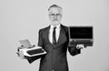 Learn it easy way. successful businessman use retro typewriter and modern laptop. man dyed beard hair. computer or Royalty Free Stock Photo