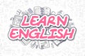 Learn English - Cartoon Magenta Text. Business Concept. Royalty Free Stock Photo