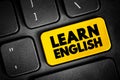 Learn English text button on keyboard, concept background Royalty Free Stock Photo