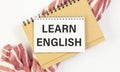 Learn English Text written on notebook page. Royalty Free Stock Photo
