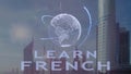 Learn French text with 3d hologram of the planet Earth against the backdrop of the modern metropolis