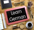 Learn German Handwritten on Small Chalkboard. 3D.