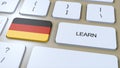 Learn German Language Concept. Online Study Courses. Button with Text on Keyboard. 3D Illustration