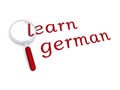 Learn german with magnifying glass Royalty Free Stock Photo