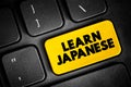 Learn Japanese text button on keyboard, concept background Royalty Free Stock Photo