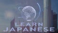 Learn Japanese text with 3d hologram of the planet Earth against the backdrop of the modern metropolis