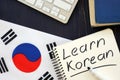 Learn Korean inscription with flag and keyboard