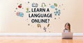 Learn a Language Online text with little girl using a laptop computer Royalty Free Stock Photo