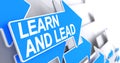 Learn And Lead - Text on Blue Arrow. 3D. Royalty Free Stock Photo