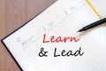 Learn & Lead write on notebook Royalty Free Stock Photo