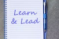 Learn & Lead write on notebook Royalty Free Stock Photo