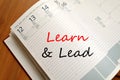 Learn & Lead write on notebook Royalty Free Stock Photo