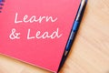 Learn & Lead write on notebook Royalty Free Stock Photo