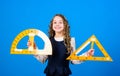 Learn mathematics. Theorems and axioms. Smart and clever concept. Sizing and measuring. Girl with big ruler. School Royalty Free Stock Photo