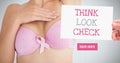 Learn more button with Think Look Check Text and Hand holding card with pink breast cancer awareness Royalty Free Stock Photo