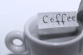 Coffee word written on a small note