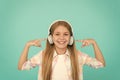 Learn song lyrics. Clear sound. Girl child listen music with modern headphones. Kid little girl listen music headphones