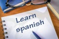 Learn spanish written in a notepad