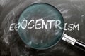 Learn, study and inspect egocentrism - pictured as a magnifying glass enlarging word egocentrism, symbolizes researching,