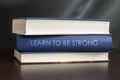 Learn to be strong. Book concept.