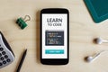 Learn to code concept on smart phone screen Royalty Free Stock Photo