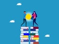 Learn to discover innovation. two people helping each other to carry a light bulb on a pile of books