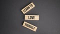 Learn to love yourself word written on wood block. objective text on table, concept Royalty Free Stock Photo