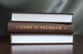 Learn to program. Book concept. Royalty Free Stock Photo