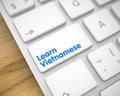 Learn Vietnamese - Inscription on White Keyboard Button. 3D. Royalty Free Stock Photo