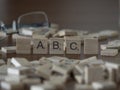 Learn your ABC with wooden tiles