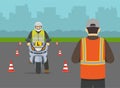 Learner motorcyclist practising to ride a moto. Learner biker on test road with red cones. Instructor writing on clipboard. Royalty Free Stock Photo