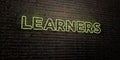 LEARNERS -Realistic Neon Sign on Brick Wall background - 3D rendered royalty free stock image