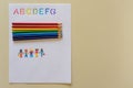 Learning ABCs with rainbow colouring pencils hand drawn children copy space Royalty Free Stock Photo