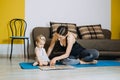 Learning Activities for Toddlers Baby. Mother reading book with cute Toddler baby daughter Royalty Free Stock Photo